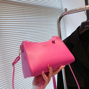 Minimalist bright pink patent leather shoulder bag with gold hardware for women