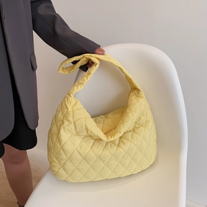Pale yellow quilted rhombus shoulder bag with chic padded nylon and casual tote style