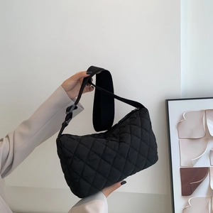 Chic black quilted rhombic pattern crossbody bag with adjustable wide fabric strap