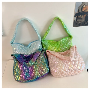 Close-up of quilted puff tote bags in metallic blue, green, purple and pink finishes