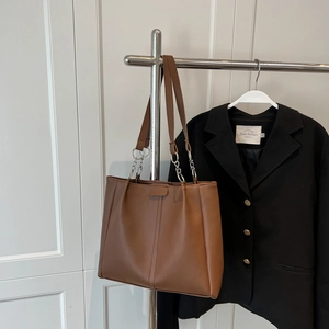 Brown leather tote bag with stylish silver metal chain handles and large capacity