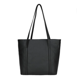 Black geometric quilted tote bag with dual shoulder straps in a minimalist trapezoid design