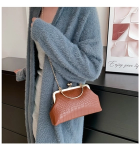 Brown crocodile embossed vintage clasp bag with gold ring handle and chain strap