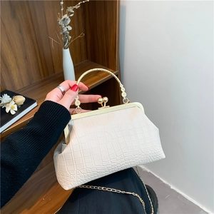 Retro off-white crocodile embossed kiss-lock bag with gold floral carved handle