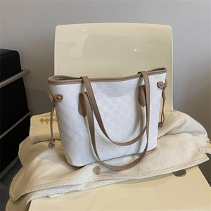 Minimalist white plaid tote bag with brown leather straps and side drawstring detail
