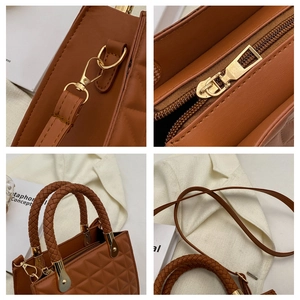 Detailed close-up of brown quilted handbag featuring woven handles and gold metal hardware