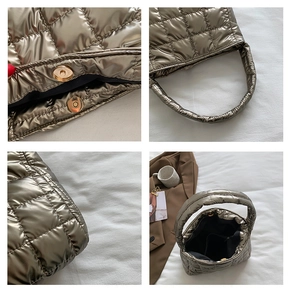 Close-up of metallic bronze quilted handbag with magnetic snap closure and grid pattern