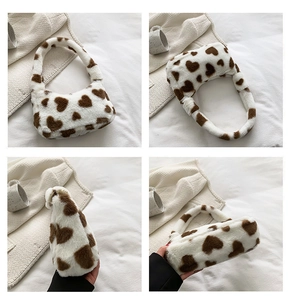 Detailed views of the plush faux fur tote with brown heart prints and arched handles