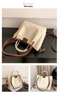 Detail view of off-white vintage tote bag showing its large capacity and sleek PU leather