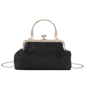 Retro black corduroy pleated evening bag with gold metal frame and handle