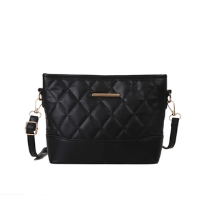 Classic black quilted hobo bag with gold metal trim and adjustable strap on white background