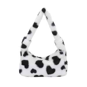 Minimalist black and white heart pattern faux fur handbag with fluffy plush texture