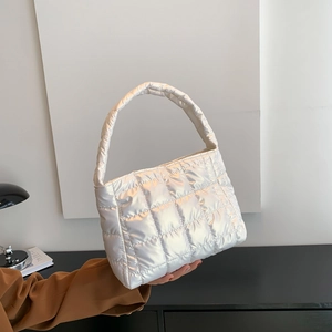 Elegant pearl white quilted puffer handbag with grid pattern and glossy finish for women