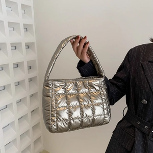 Quilted silver padded tote bag with grid embroidery and metallic puffer texture