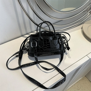 Black crocodile texture mini handbag with silver rings and adjustable strap