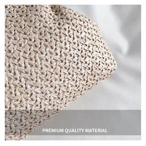 Macro view of tight woven texture on beige straw bag with natural fiber patterns