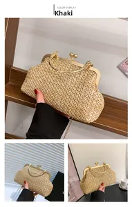 Detail of khaki woven crossbody bag with gold bead clasp and metallic chain strap