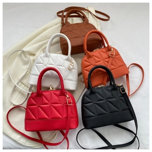 Quilted shell bags in multiple colors featuring gold hardware and removable straps
