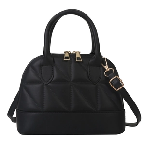 Fashionable black quilted dome handbag with gold zippers and adjustable shoulder strap