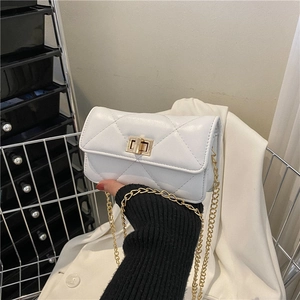 Minimalist white quilted shoulder bag with gold chain strap and turn-lock closure