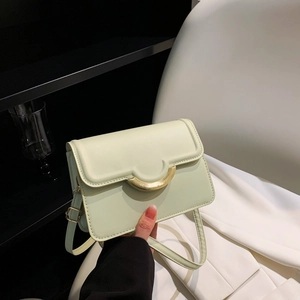 Minimalist mint green PU leather crossbody flap bag with a golden metal buckle detail