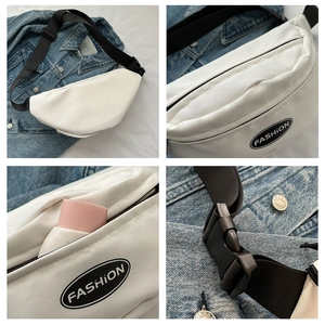 Detail of white fashion crossbody bag interior showing storage space and durable zipper
