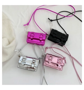 Detailed overhead view of mini Y2K crossbody bags in candy colors with acrylic chains