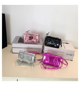 Close-up of mini metallic Cambridge bags in multiple colors with chain straps