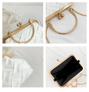 Detail of white woven handbag with vintage gold spherical clasp and textured metal handle