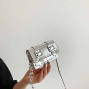 Mini silver metallic satchel with double buckles and decorative acrylic chain