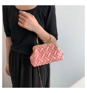 Pink satin clutch bag with woven texture, gold handle and metal chain for evening wear