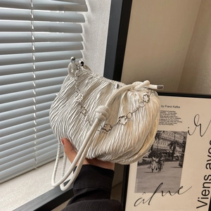 Chic white pleated shoulder bag with floral silver chain and minimalist design