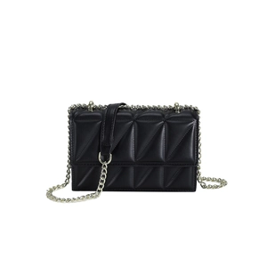 Fashionable black quilted chain crossbody bag with triangular stitching and silver hardware