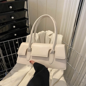 Minimalist cream beige rectangular underarm bag with sleek leather finish and twin top handles