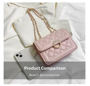 Detail view of pink quilted chain bag with pearl buckle showing smartphone size comparison