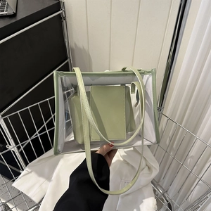 Large pale green clear PVC tote bag with leather inner pouch and shoulder straps
