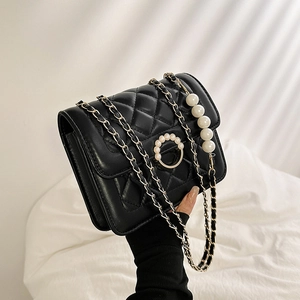 Chic black quilted crossbody bag with pearl ring buckle and elegant gold chain strap