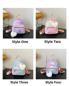 Detailed grid of mini backpacks in gradient macaron colors with plush heart pendants