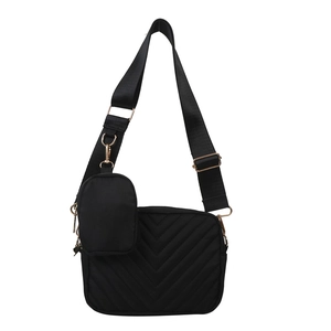 Retro black crossbody bag with V-shaped quilting, mini pouch and golden hardware