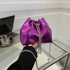 Metallic purple mini bucket bag with crocodile pattern and pearl chain strap details