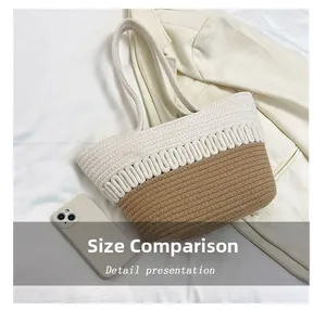 Detail view of woven tote bag showing size comparison with a smartphone inside