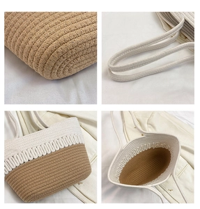 Detail view of woven straw tote showing stitching, strap texture and spacious interior