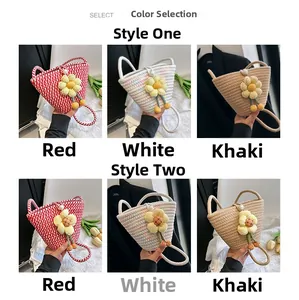 Detail of woven straw bucket bags with pearl clasps and handmade floral charms