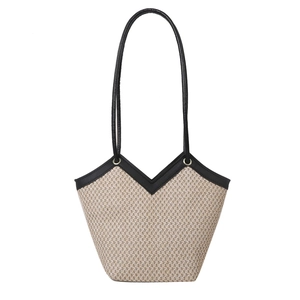 Sac fourre-tout tissé chic en paille beige avec bordures noires et longues anses
