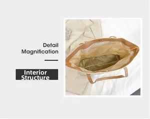Detailed internal structure of the spacious tote bag featuring a secure magnetic metal clasp