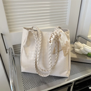 Large cream tote bag with houndstooth texture and silk scarf handle decoration