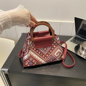 Retro geometric jacquard handbag with solid wood handles and a burgundy leather shoulder strap