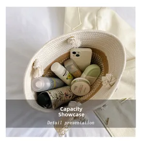 Top view of woven straw bucket bag showing large capacity with daily essentials inside
