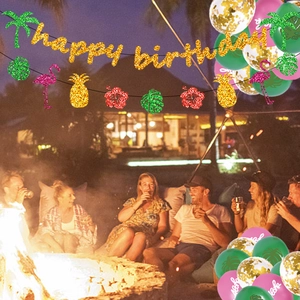 Hawaiian birthday party set with glitter banners, flamingo pineapple flags and Aloha balloons
