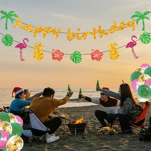 Hawaiian party banner with gold glitter Happy Birthday sign, flamingos and pineapples